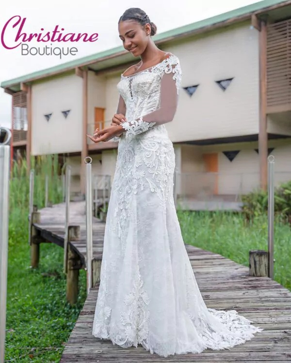 Sur Christiane Boutique, profitez de nos robes de mariée en solde, idéales pour celles recherchant une robe de mariée simple et pas chère. Notre e-shop robe de mariée propose une vaste sélection pour toutes les occasions. Pour être chic pour un mariage, explorez nos robes de soirée en magasin ou en ligne. Que ce soit pour une robe de soirée mariage femme ou une robe de soirée courte chic, nous avons ce qu’il vous faut. Découvrez également nos robes vertes de mariage et robes de cocktail mariage longues. Nos ventes de robes de soirée incluent des modèles variés, et nous avons une belle collection de robes de mariage pour toutes les préférences. Disponibles dans des destinations comme la Guadeloupe, la Martinique, la Guyane, la Côte d'Ivoire, et bien plus encore.