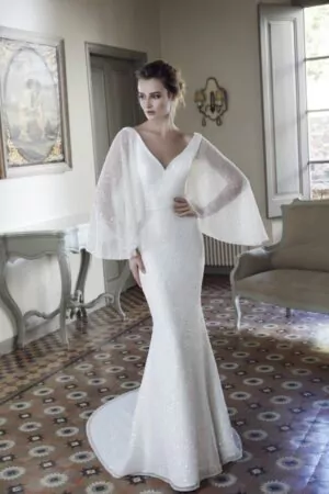 Découvrez Christiane Boutique, votre spécialiste en tenue de soirée femme classe. Nos robes de mariée pour le soir et robes de civil mariage sont parfaites pour toutes vos célébrations. Profitez de nos robes de mariage civil pas chères, idéales pour un budget maîtrisé. Renseignez-vous sur nos prix de robe de mariée compétitifs, et pour l'hiver, nos robes de soirée mariage hiver sont là pour allier élégance et chaleur. Visitez notre magasin des robes de soirée pour des pièces uniques, disponibles avec livraison rapide. Que vous soyez en Guadeloupe, Martinique, France, Canada, ou même aux États-Unis, Christiane Boutique vous offre une sélection de robes de cérémonie de mariage et de robe de soirée longue blanche pour mariage pour que chaque moment soit inoubliable.